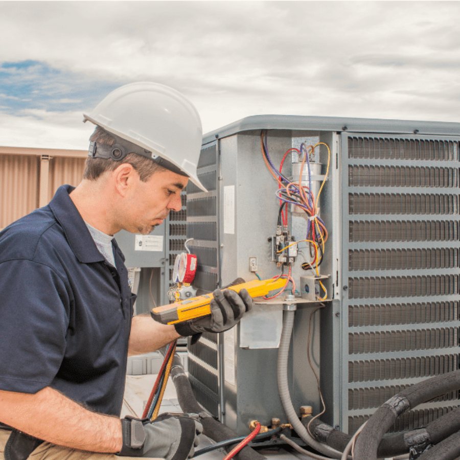 Oakville HVAC Pros HVAC technician servicing a system