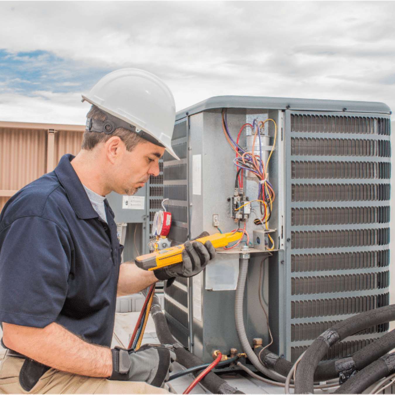 Oakville HVAC Pros HVAC technician servicing a system